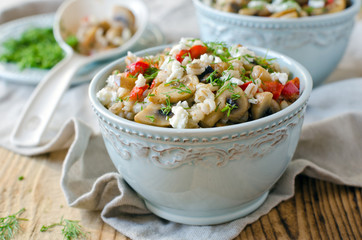 Barley porridge with mushrooms and vegetables