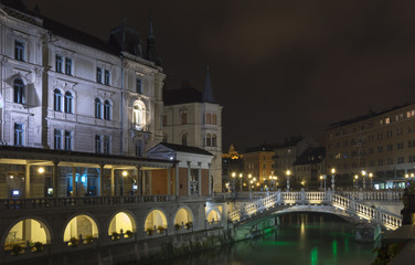 Fototapeta na wymiar Night winter shoot of Three bridges - Ljubljana