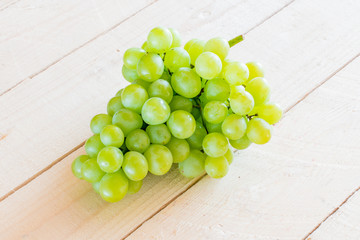 Grapes on a wooden table 