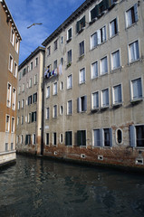 Fototapeta na wymiar Houses and Buildings in water of Venice Grand Channel