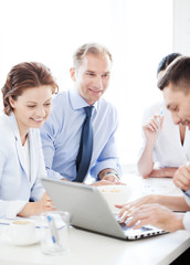 Fototapeta premium businessman with team on meeting in office