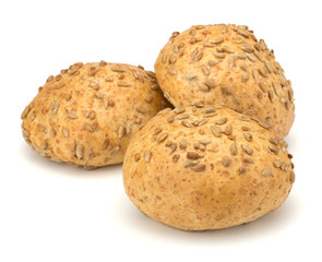 Round sandwich bun with sunflower seeds isolated on white backgr