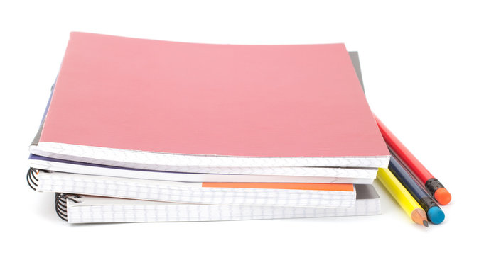 Notebook stack and pencils. Schoolchild and student studies acce