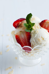 vanilla ice cream with almonds and strawberries