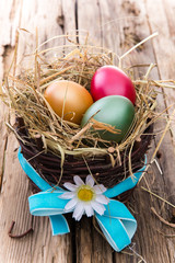 Easter eggs on wooden background