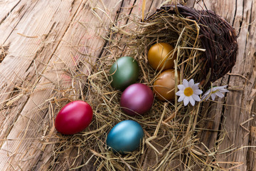 Easter eggs on wooden background