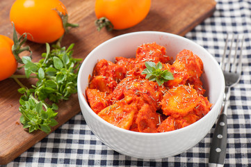 Potatos Bravos with oregano and yellow tomatoes
