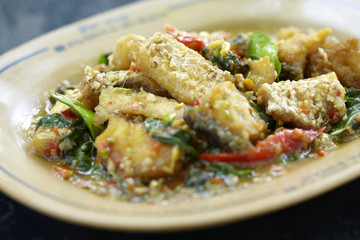 spicy salmon and herb fried in thailand