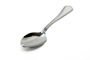 metal spoon for soup isolated on a white background.