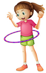 A young girl playing hulahoop