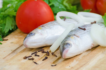 Mugil cephalus fish with vegetables.