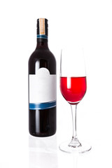 isolated of the red wine bottle with glass on white background