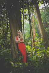 Beautiful lady in tropical forest