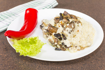 Millet porridge with mushrooms