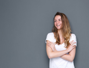 Woman smiling with arms crossed