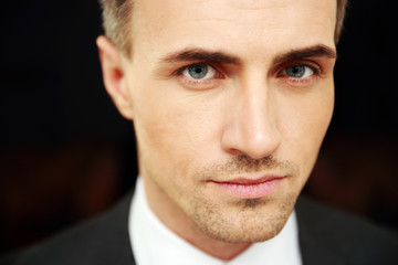 Closeup portrait of a confident businessman at office