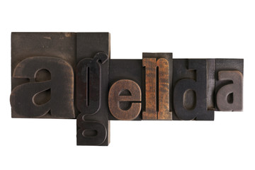 agenda, word written in letterpress type blocks