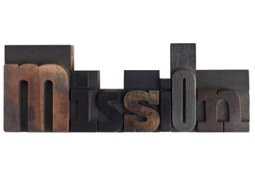 mission, word written in letterpress type blocks