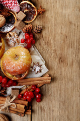 Christmas background of Homemade baked stuffed apples and spices