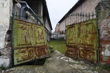 Broken rusty gate