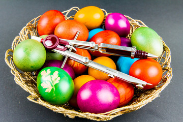 Decorated Easter eggs in a engineer woven basket