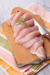 Fresh chicken on wooden table