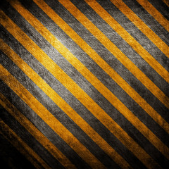 metal background with hazard stripes