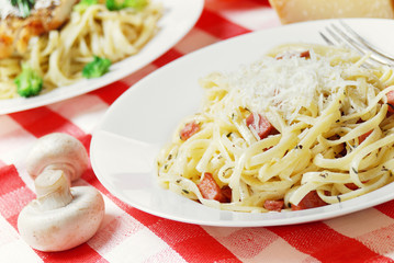 Pasta carbonara on the wooden table