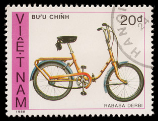 Fototapeta premium Stamp printed by Vietnam shows bicycle Rabasa Derbi