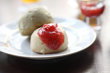 scones tea with strawberry jam