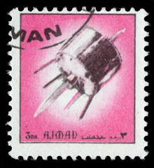 Obraz premium Stamp printed in emirate Ajman show spaceship, circa 1972