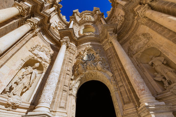 Valencia cathedral door in plaza de la Reina square Spain