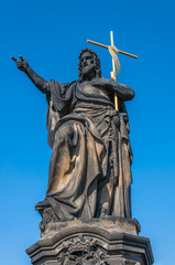 Statue of Jesus on Charles Bridge in Prague, Czech Republic.