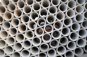 Concrete pipes stacking, background and pattern