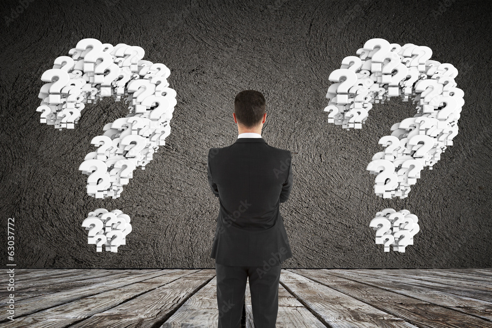 Poster man looking at question mark