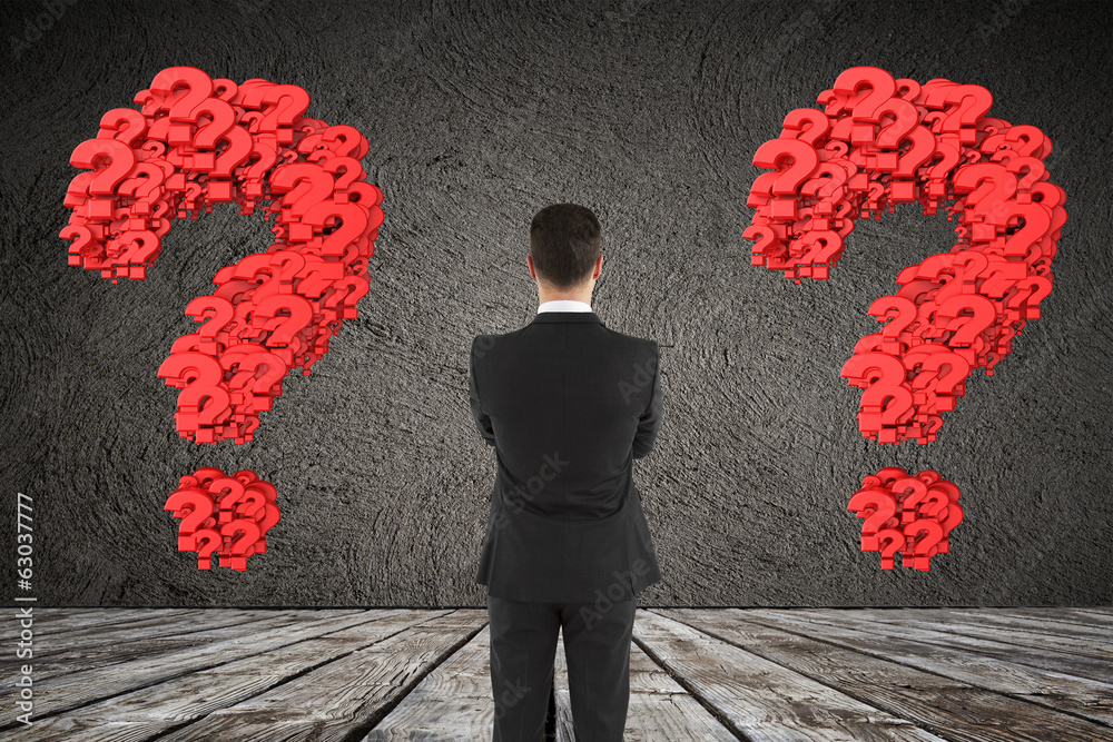 Poster man looking at question mark