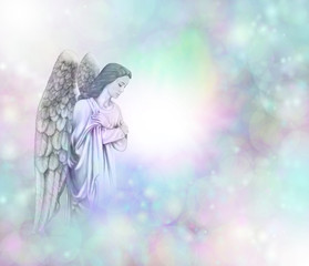 Angel on soft misty bokeh frame background
