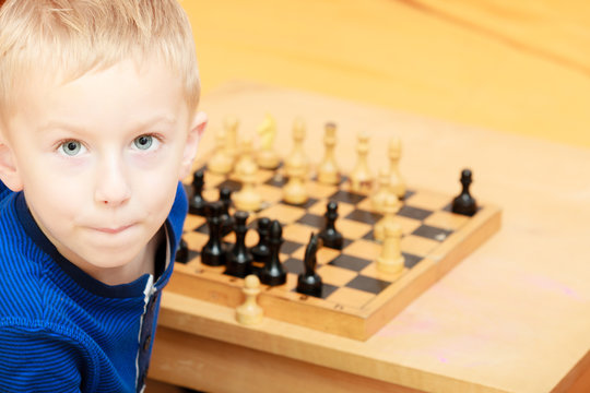 Kids Early Development. Pupil Kid Thinking about His Next Move in a Game of  Chess. Stock Image - Image of child, chess: 172839087