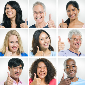 Multi-Ethnic Group Of People Giving Thumbs Up