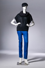 Full length Fashion female clothing in hat on mannequin