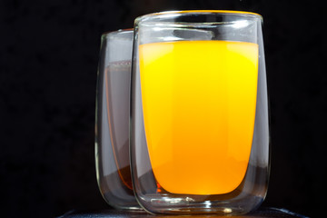 two glasses with drinks