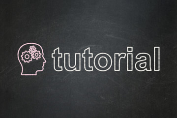 Education concept: Head With Gears and Tutorial on chalkboard