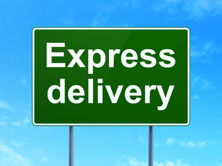 Business concept: Express Delivery on road sign background