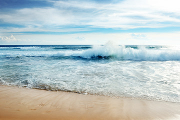 Ocean waves and blue sky