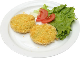 Baked vegetable marrow, served with vegetables