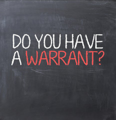 Warrant authorization document concept on blackboard