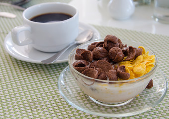Chocolate cornflakes Corn flakes with milk and coffee