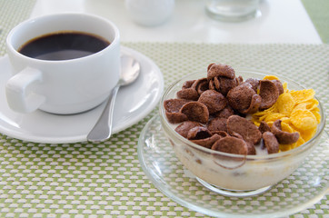 Chocolate cornflakes Corn flakes with milk and coffee