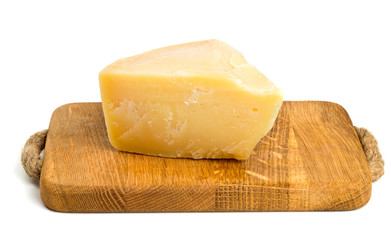 parmesan cheese on cutting board isolated