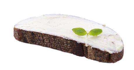Slice of rye bread with butter, isolated on white